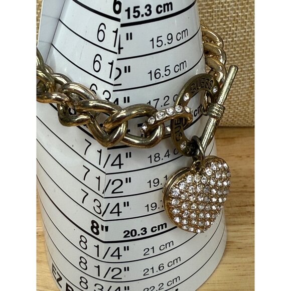 Guess Gold-Tone Chain-Link Toggle Bracelet With Pave Crystal Heart Charm - Picture 6 of 13
